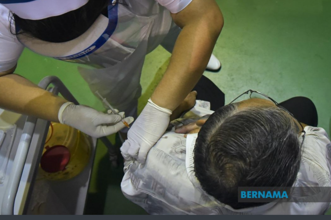 Vaccinating as many people as possible the only way out from COVID-19, says Muhyiddin